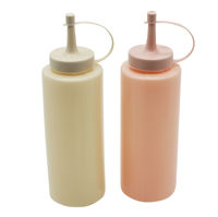 Imagen de Botella dispensador de plástico con pico x2, para salsas, en bolsa