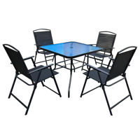 Imagen de Mesa de metal color negro tapa de vidrio, con 4 sillas de metal y textiline