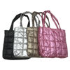 Imagen de Cartera de nylon brillosa, con broche imantado, asas y bolsillo frontal, varios colores