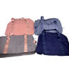Imagen de Bolso deportivo con asas y correa, bolsillos laterales y enganche para valija, varios colores